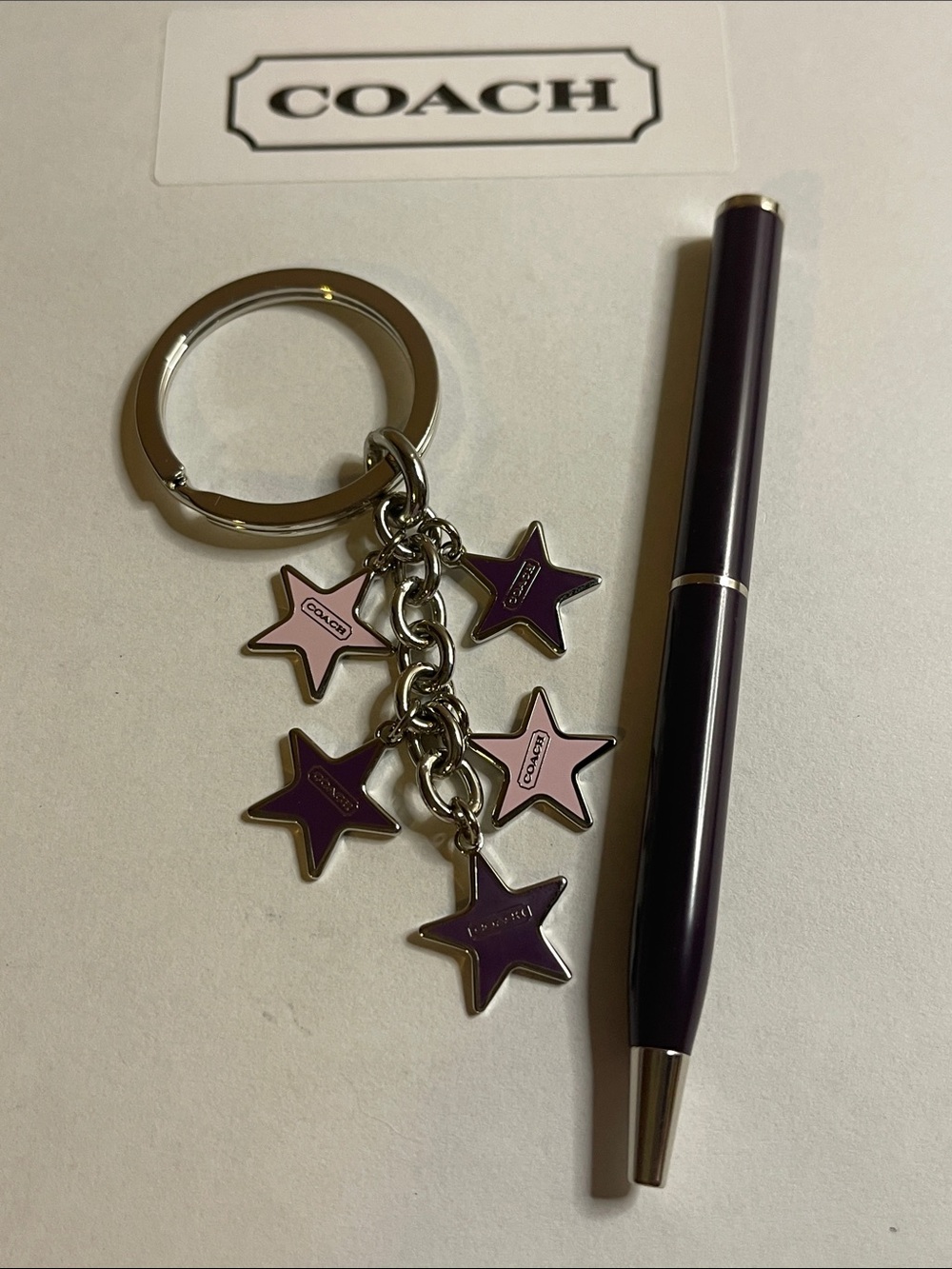 Coach Pink and Wine Star Charm Keychain and Wine Coach Pen